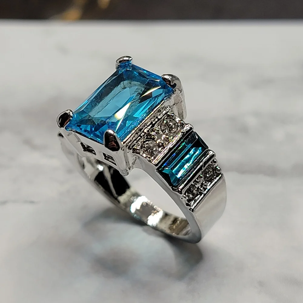 Silver Tone Simulated Blue Topaz Gemstone Ring